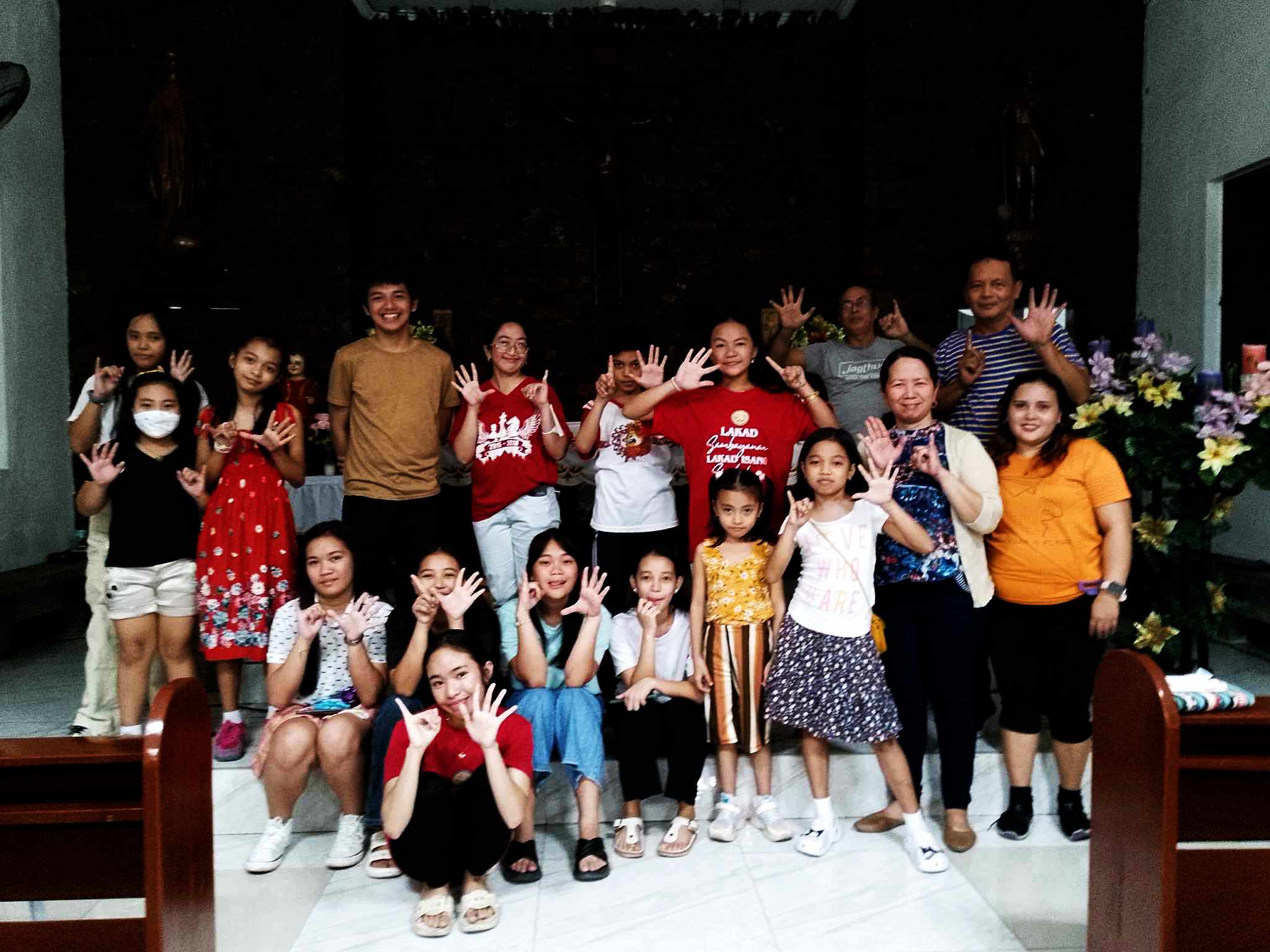 Interior of a church showing rows of wooden pews